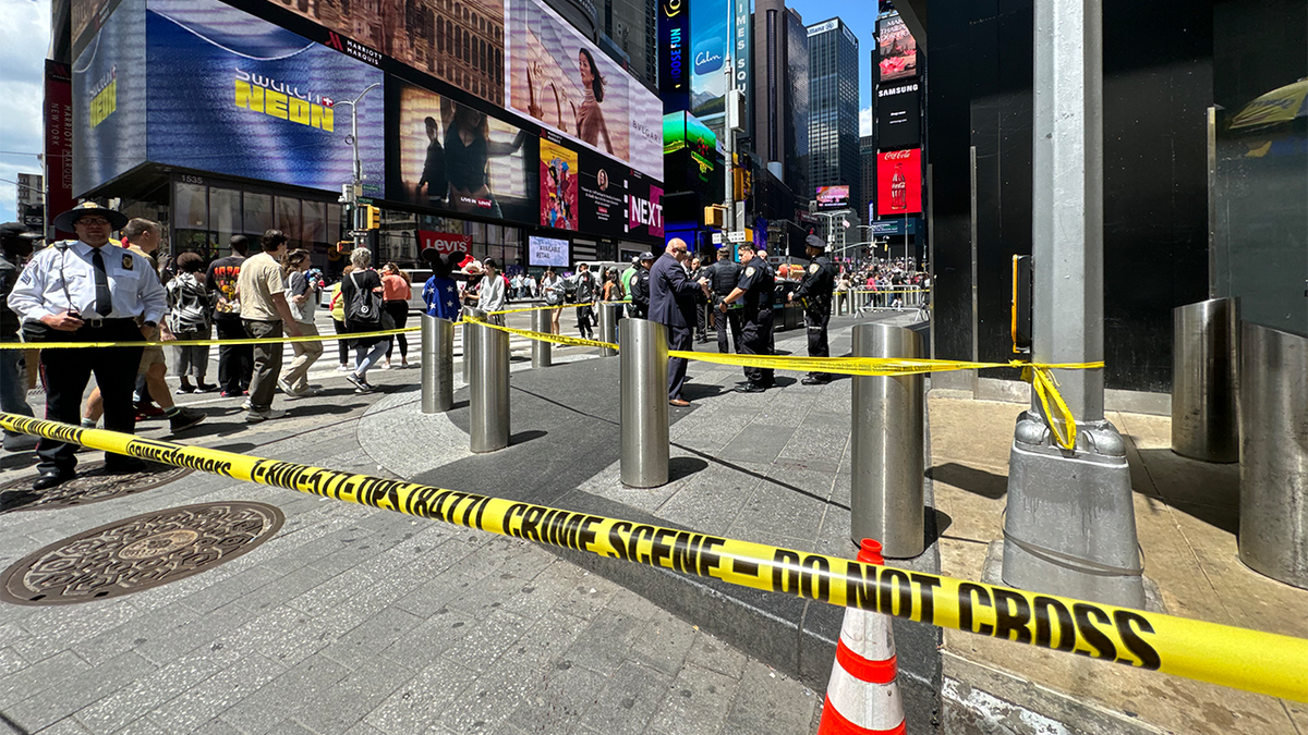 Crime scene tape cordons off an area in Times Square