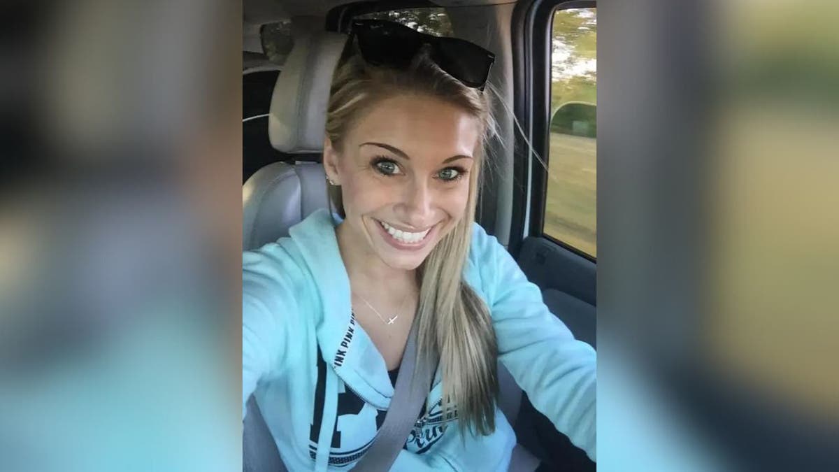 Emily Strite smiling in a car. Her body was found on Saturday