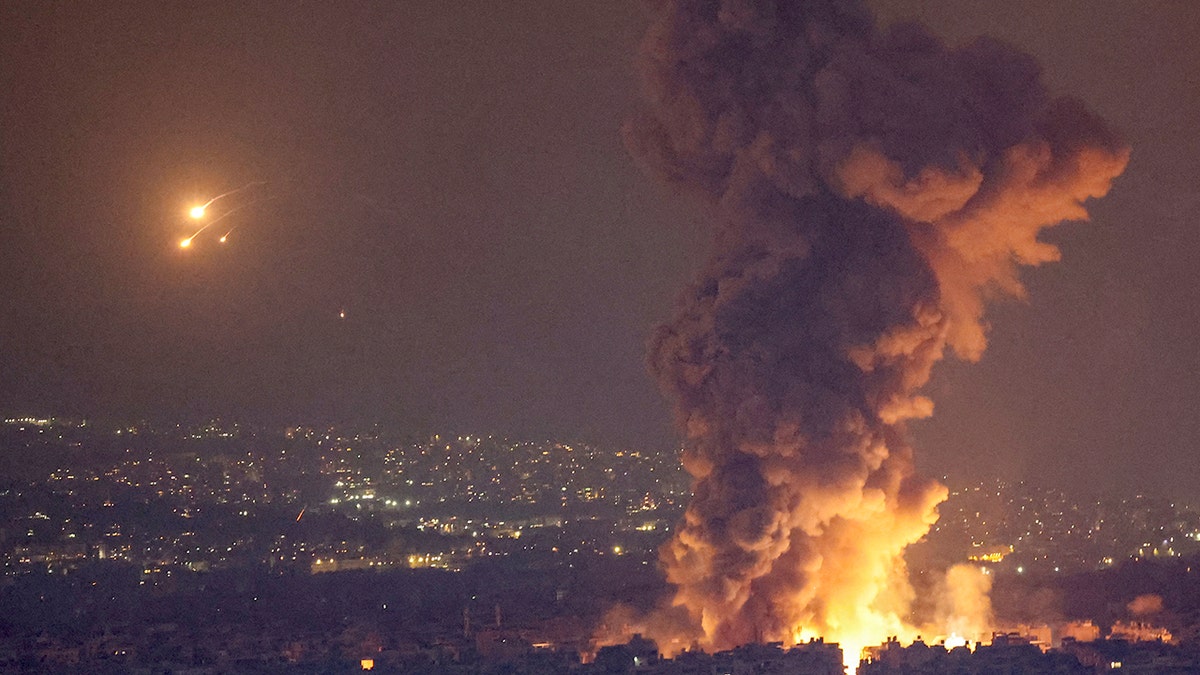 Smoke and flames rise in Beirut's southern suburbs after Israeli airstrikes as seen from Sin El Fil, Lebanon, October 6, 2024.