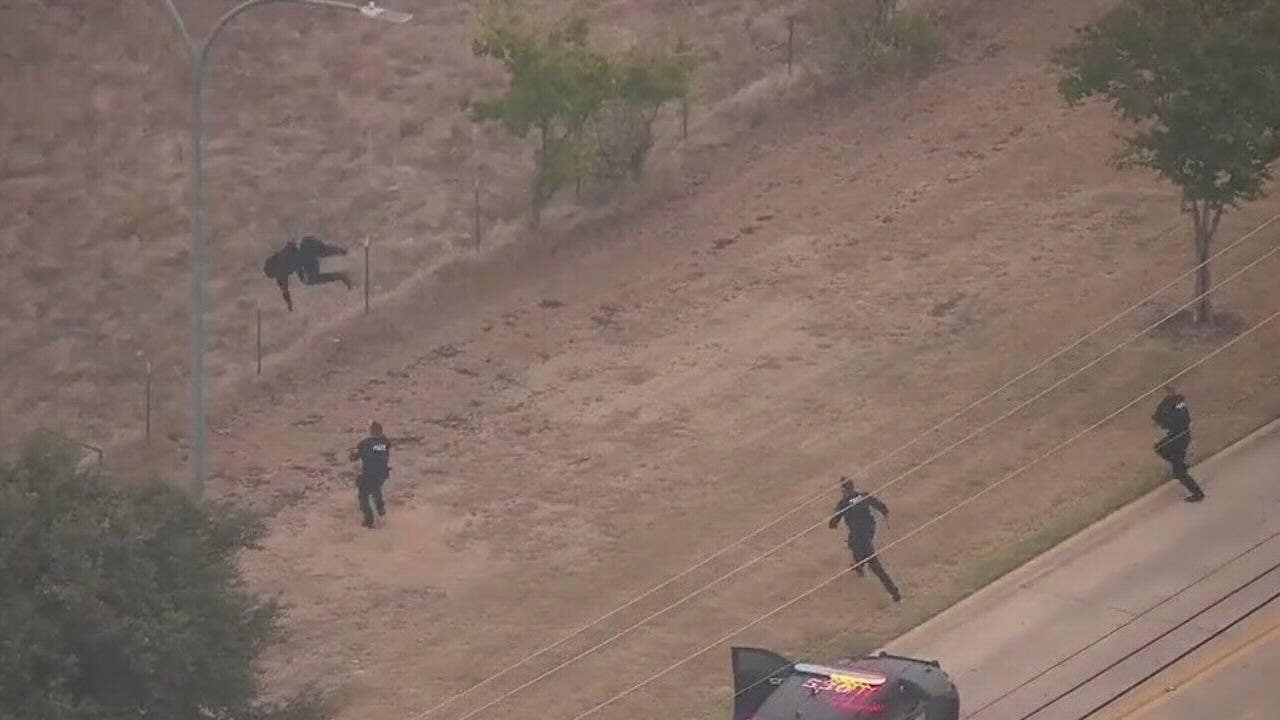 WATCH: Acrobatic Texas fugitive front-flips over fence before epic take down