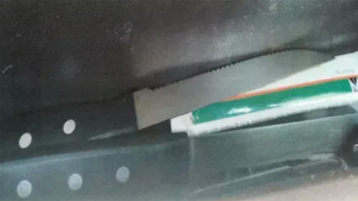 Pictured is a knife used in the attacks and recovered inside Delgado's car by police in the Dominican Republic