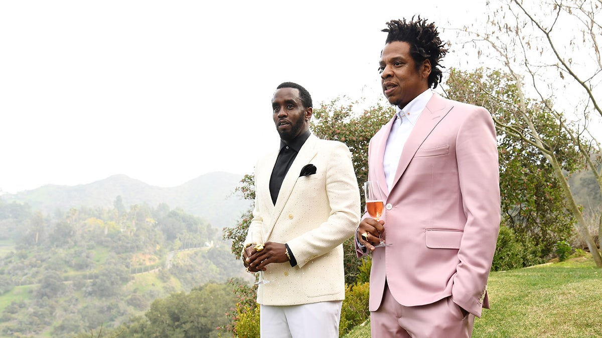 Sean Diddy Combs and Jay-Z wear colorful suits at Roc Nation brunch