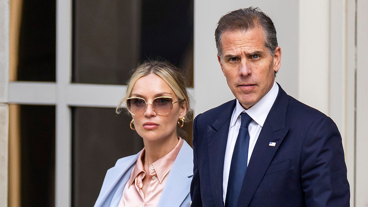 Hunter Biden with wife outside court