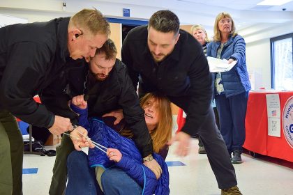 Private security guards who dragged Idaho woman from town hall meeting hit with charges