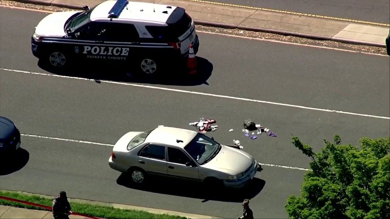 Virginia police officers shot during traffic stop near popular shopping center; suspect arrested
