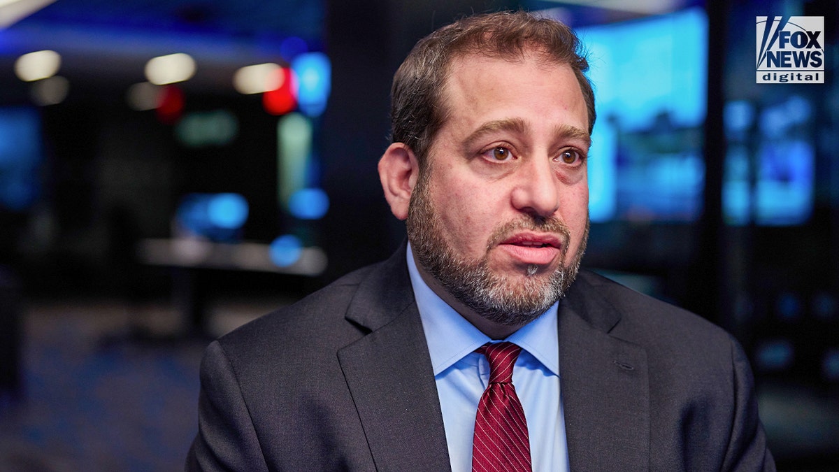 The Anti-defamation League's Oren Segal speaks to a reporter