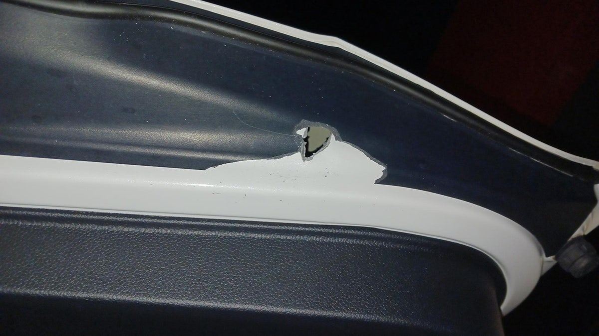 Bullet hole in Honda CRV seen after Florida interstate shooting