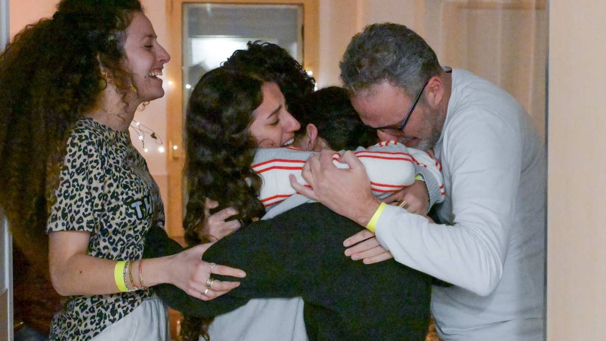 Romi Gonen is warmly embraced by her family following her release from Gaza by Hamas terrorists as part of the ceasefire deal.