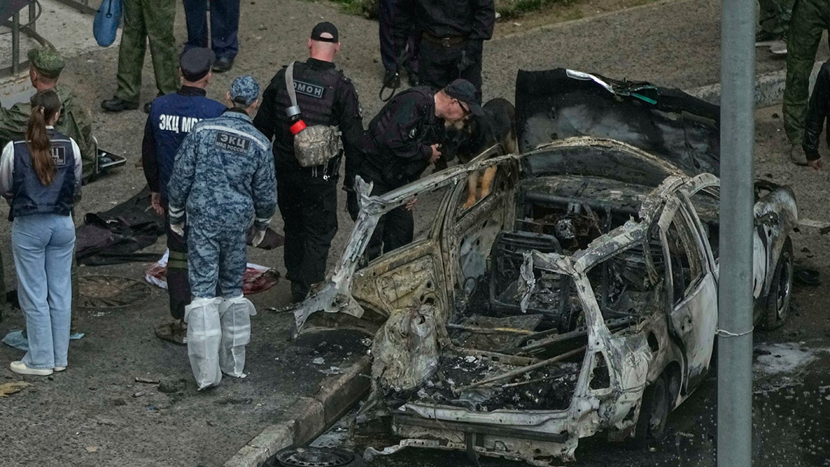 Investigators at Russia car bombing scene