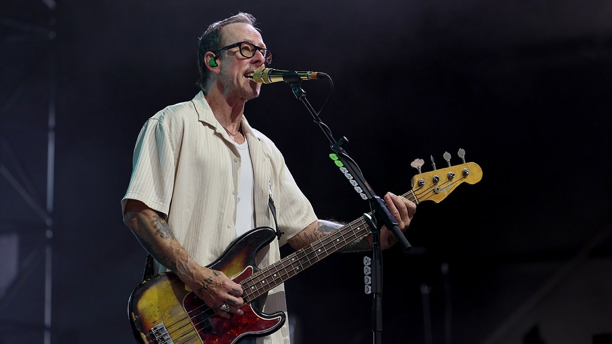 Scott Shriner performing at Coachella