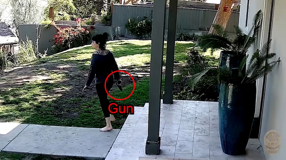 Jillian Shriner allegedly holding gun in security came footage