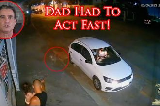 Dad Has Split Second To Protect Himself And His Baby From Charging Dog