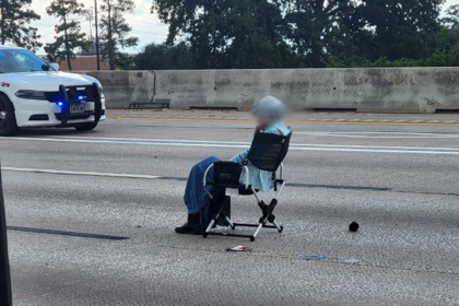 Armed Texas woman sat in lawn chair on busy highway during hours-long standoff with police