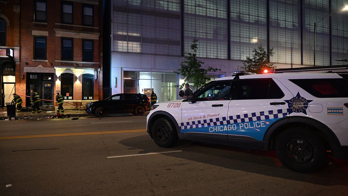 Chicago police cruiser outside scene of shooting
