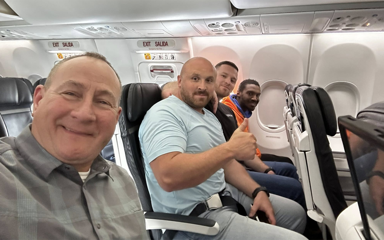 Smiling fugitive recaptured and returned to Kentucky after dramatic airport escape