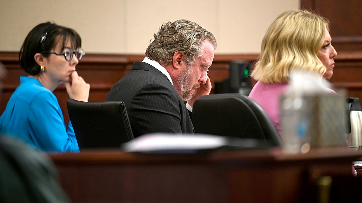 Dentist James Craig cries in court while on trial for his wife's murder