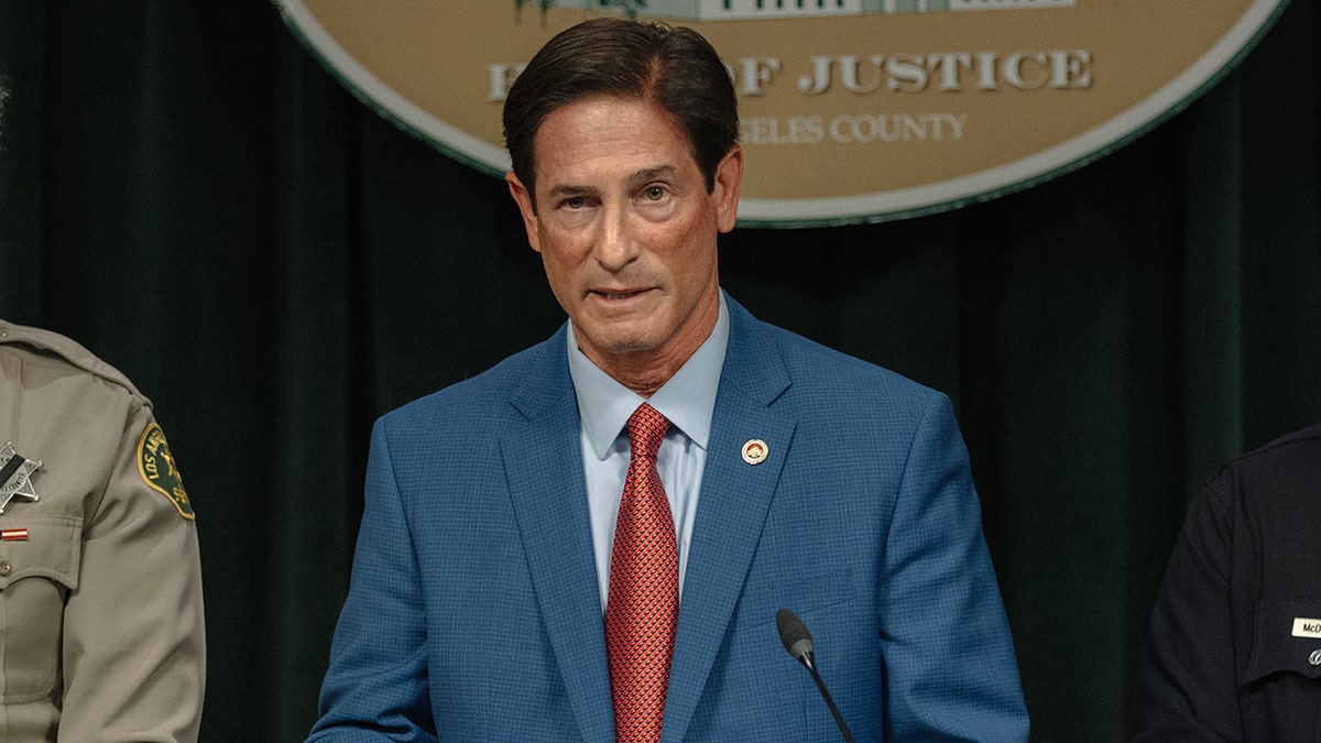 Nathan J. Hochman speaks at a press conference about the LA protests