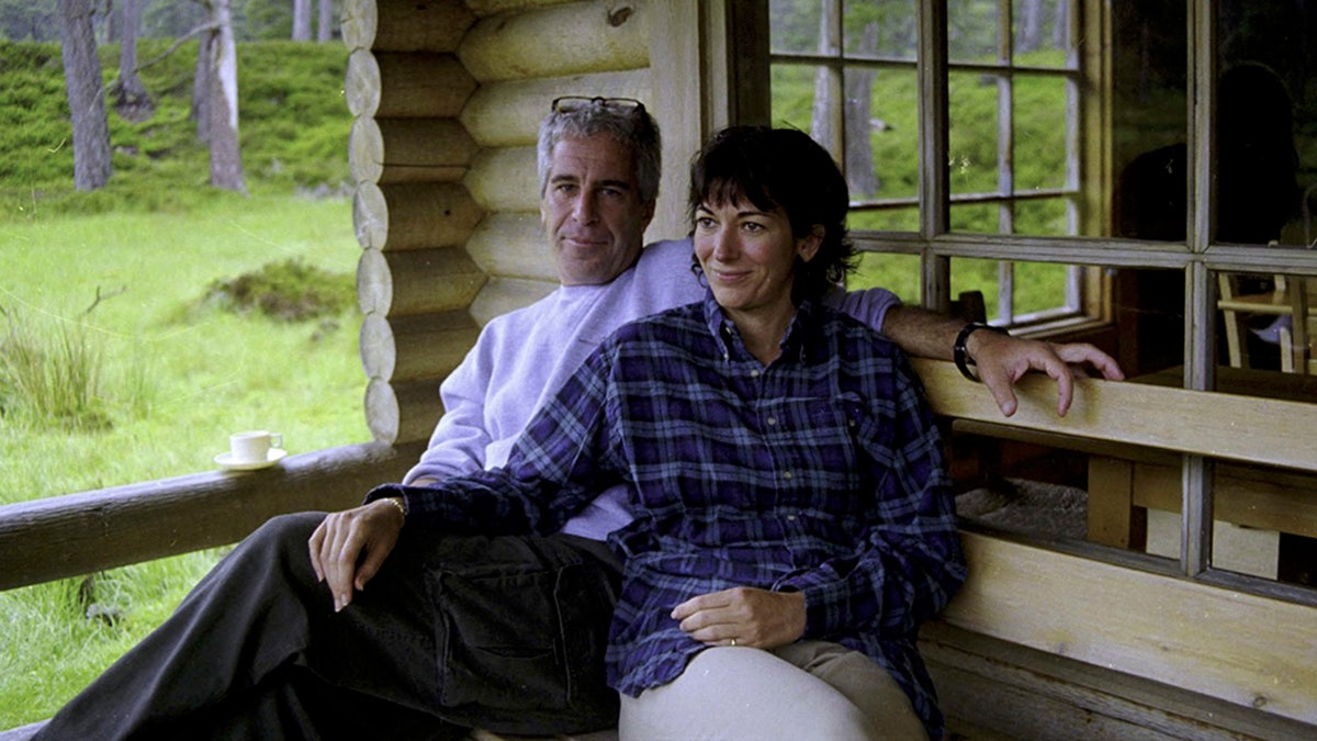 Ghislaine Maxwell and Jeffrey Epstein smile