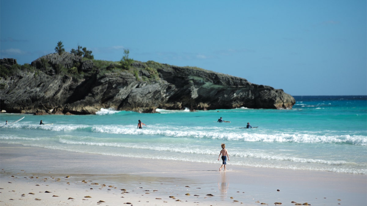 Beach in Bermuda with people on it.