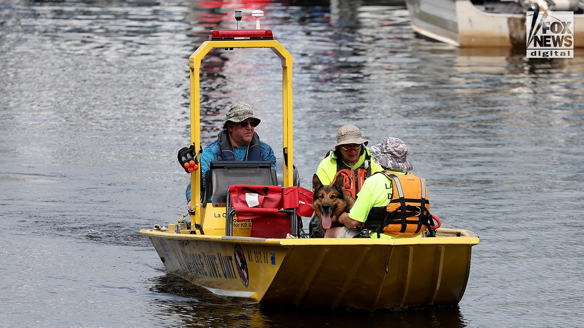 Search and rescue teams look for the body of missing persons Eliotte Heinz.