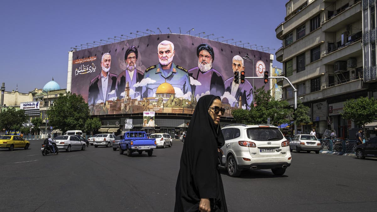 Portrait of Iran-aligned leaders seen in Tehran