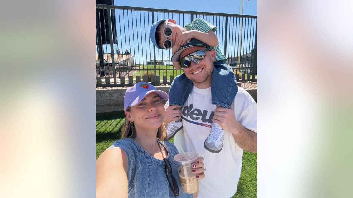 The Kiser family. Emilie, Brady and Trigg in family photo