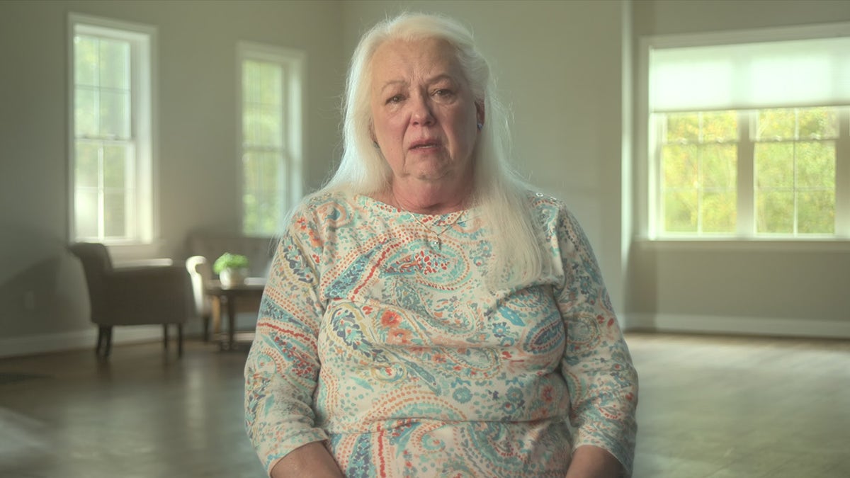 Iva Bradley wearing a white multiprinted sweater.