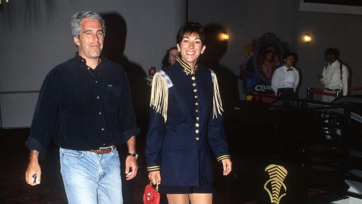 Jeffrey Epstein in jeans and a dark shirt accompanies Ghislaine Maxwell to a movie premiere