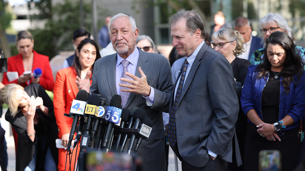 Supporters of the Menendez brothers outside court following the favorable ruling in the resentencing hearing.