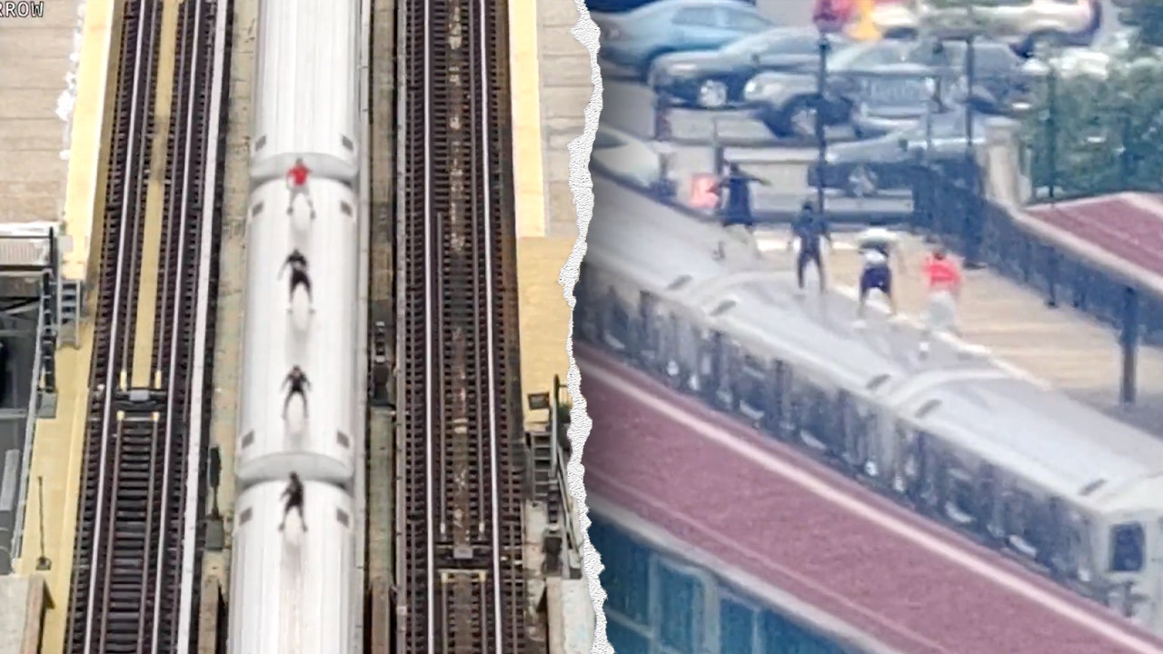 Drone surveillance catches kids in dangerous high-speed stunt atop moving subway train in New York City