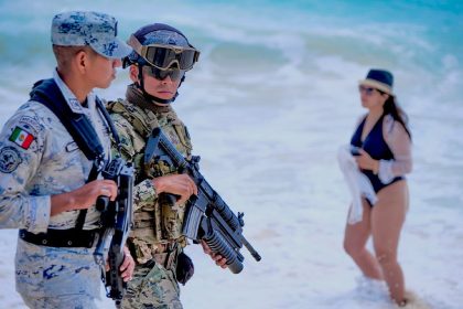 Americans in vacation hot spot may see more military than margaritas this summer
