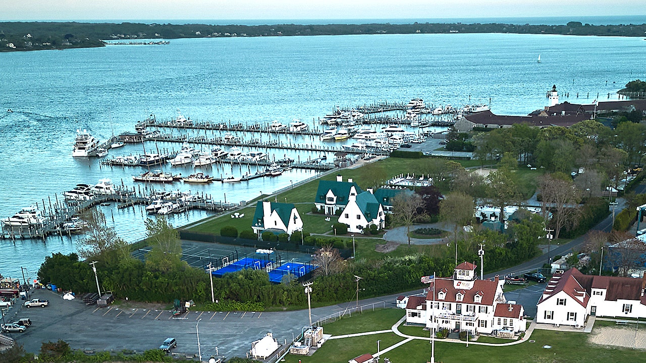 Exclusive waterfront enclave rocked after body found near yacht club