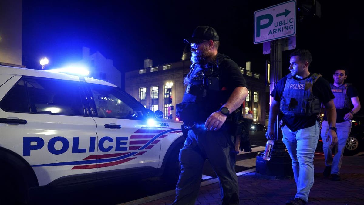 Police officers patrol Washington