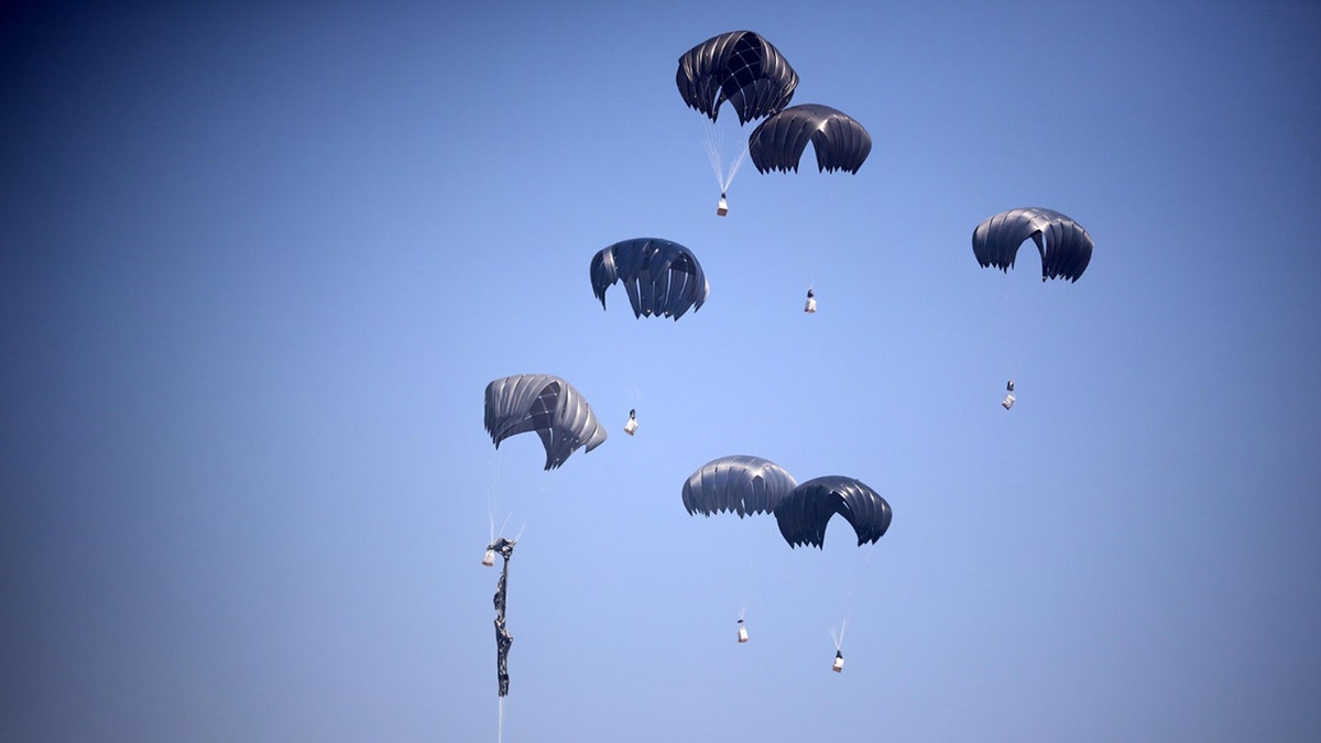Jordanian and UAE planes drop humanitarian aid into the Gaza Strip on July 27.