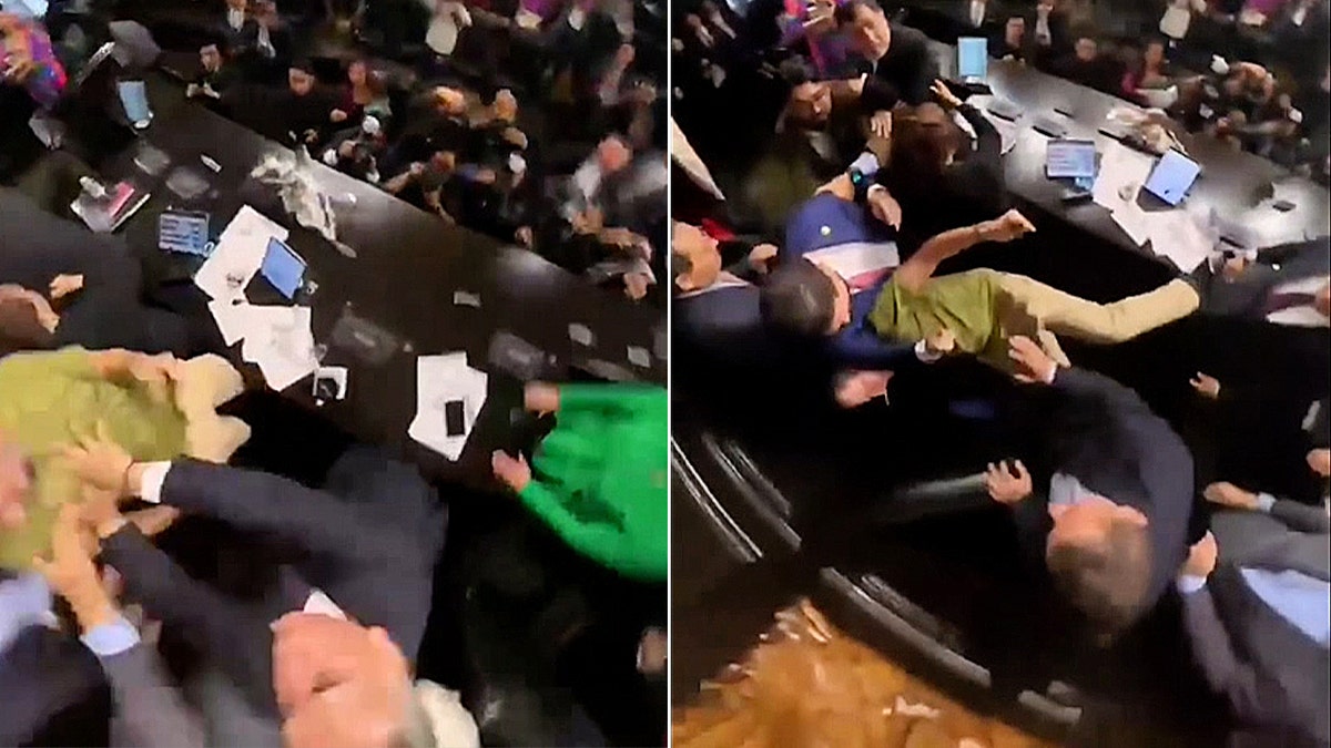 man pushed down to the floor