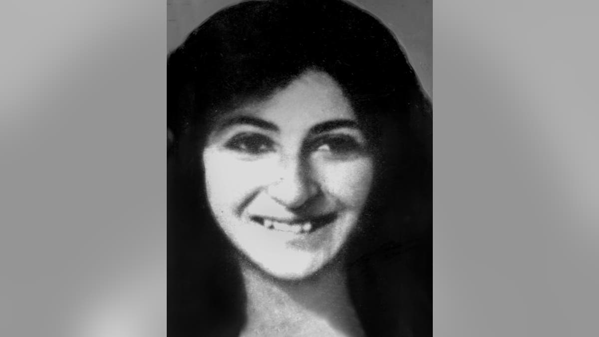 A close-up of Virginia Voskerichian smiling.