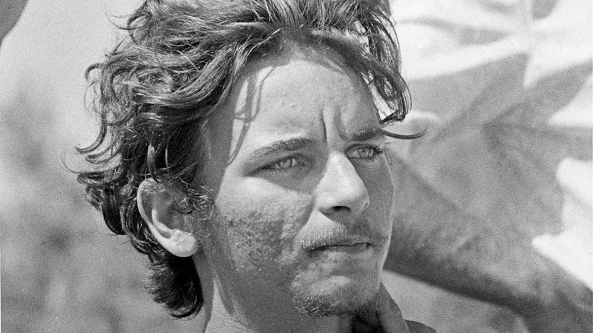 A close-up of Elmer Wayne Henley Jr. looking ahead.