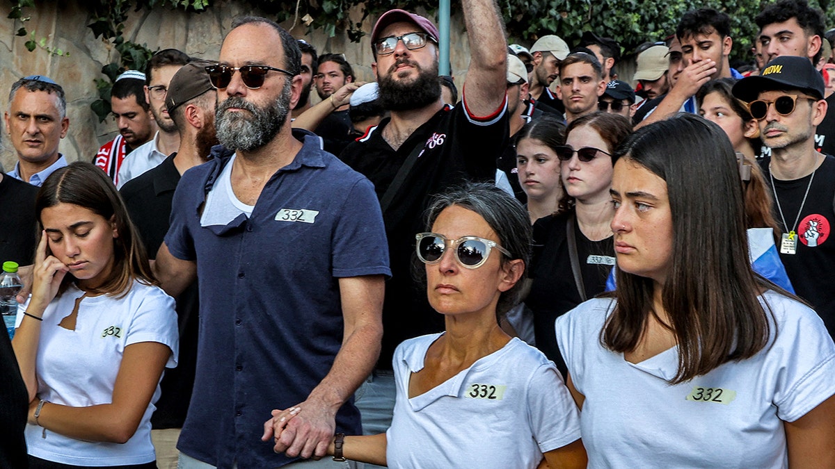 Jon and Rachel Polin demonstrate for son Hersh