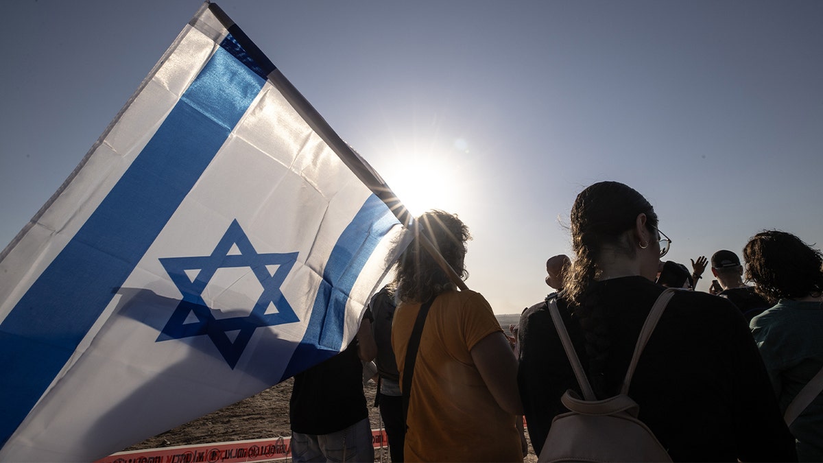 Israelis march from Sderot toward the northern border of Gaza, calling for the re-establishment of settlements in the territory, on July 30, 2025 in Israel.