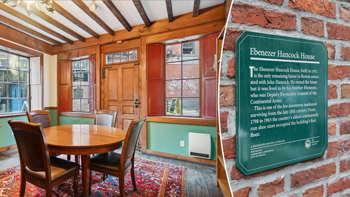 Interior of 1700s home with table, historic designation plaque