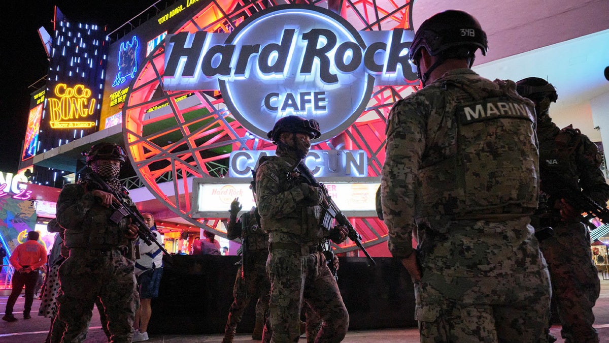 Mexico military in front of Hard Rock Cafe.