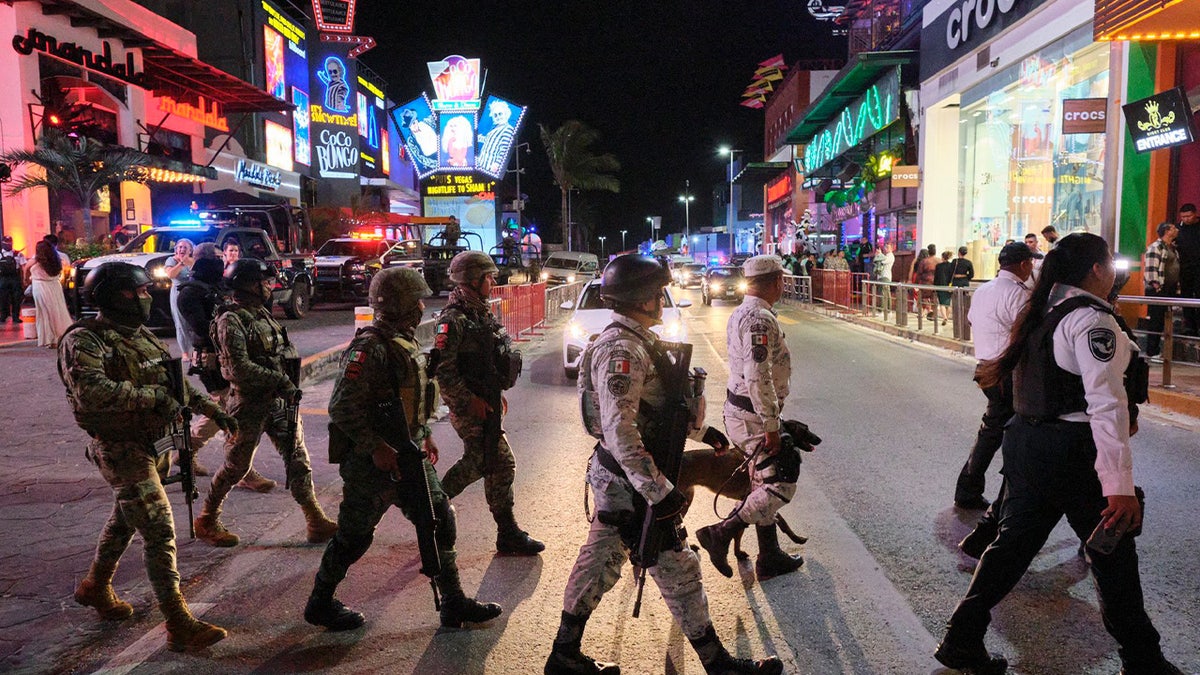 Law enforcement patrol Mexico's streets at night.