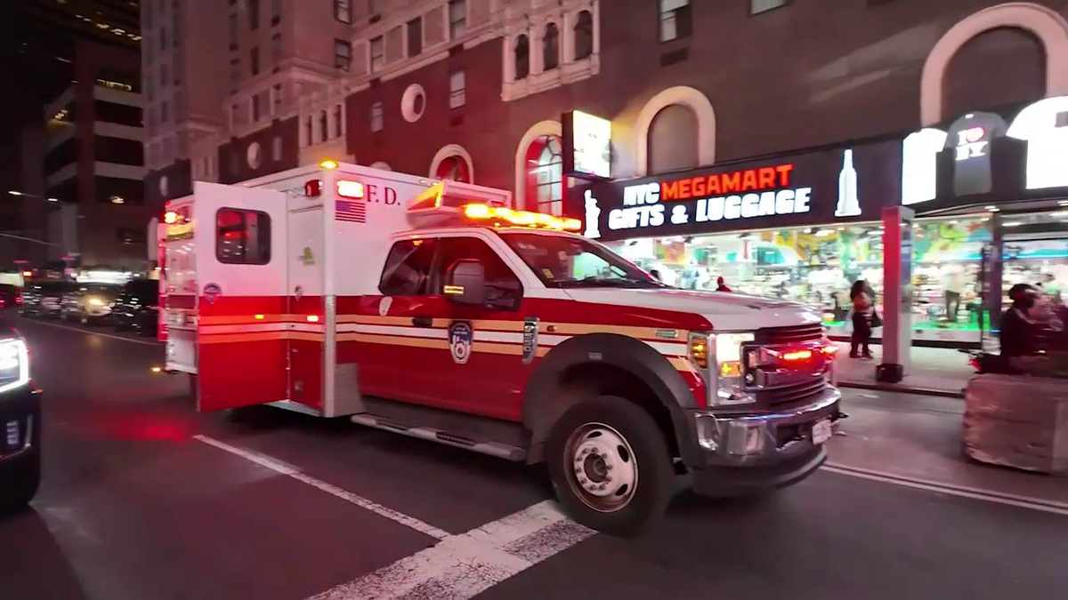 A man was transported to a hospital after he was pushed onto the train tracks