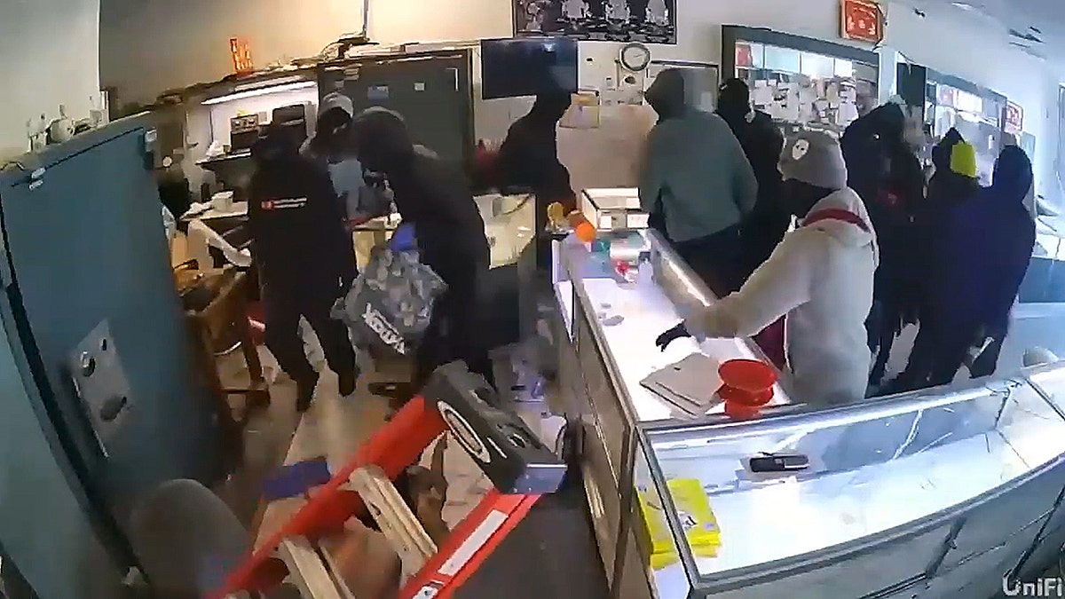 Jewelry shop owner pushed down