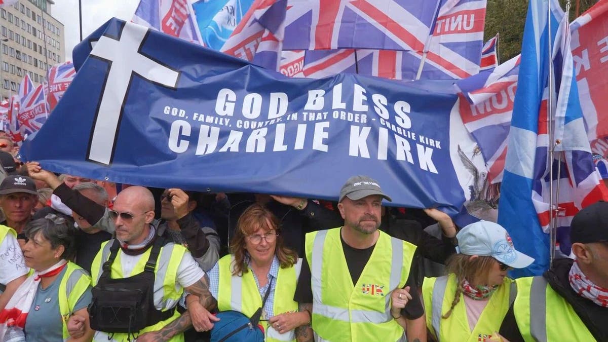 Charlie Kirk banner London rally