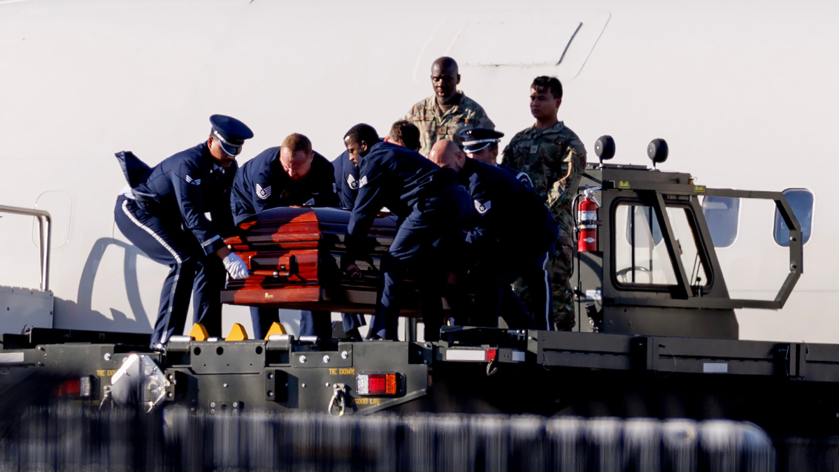 The casket of Charlie Kirk is removed from Air Force Two