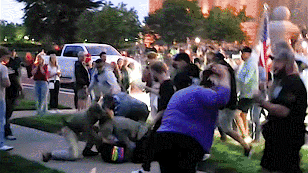 Video captures fight erupting at Charlie Kirk vigil after activist reportedly shouts profanity at crowd