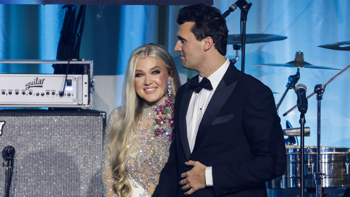 Erika Kirk and her husband Charlie Kirk at TPUSA event