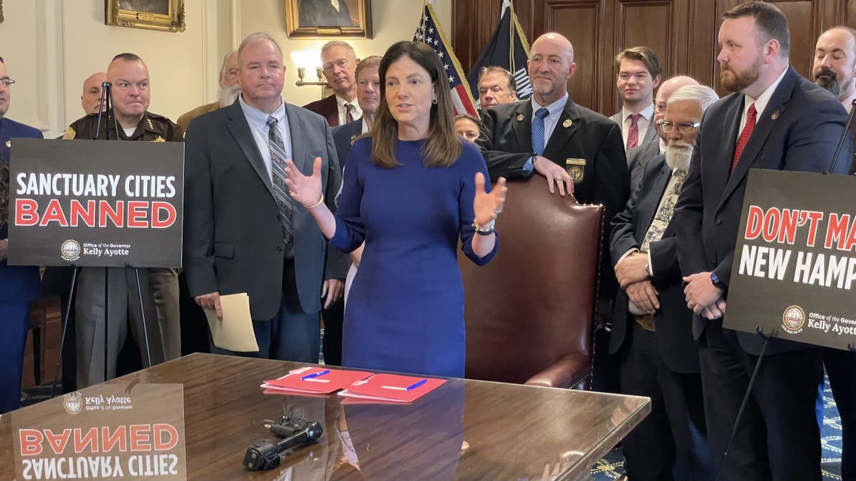 New Hampshire Gov. Kelly Ayotte speaks at the statehouse