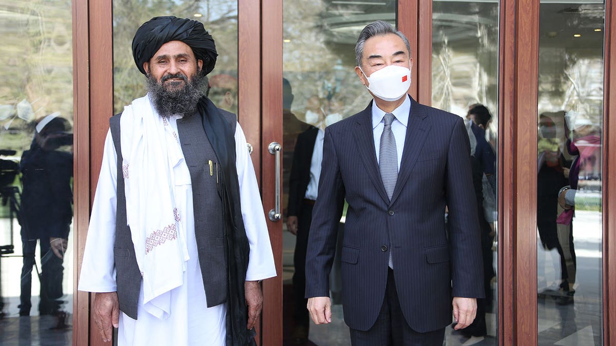 Wang Yi with the Taliban